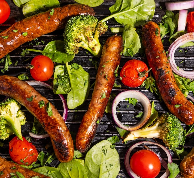 Sustainable plant-based, nutritionally-dense, hypoallergenic protein and fibre sausages with vegetables surrounding