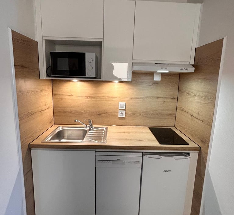 pose de cuisine dans un appartement étudiant