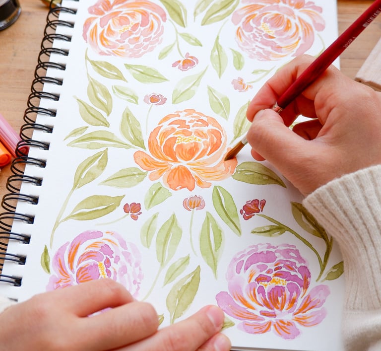 Handwritten by Belle NYC floral illustrator painting a customized floral pattern using watercolor