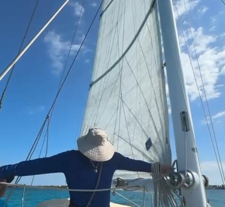a man learning in a sailboat course in Cancun