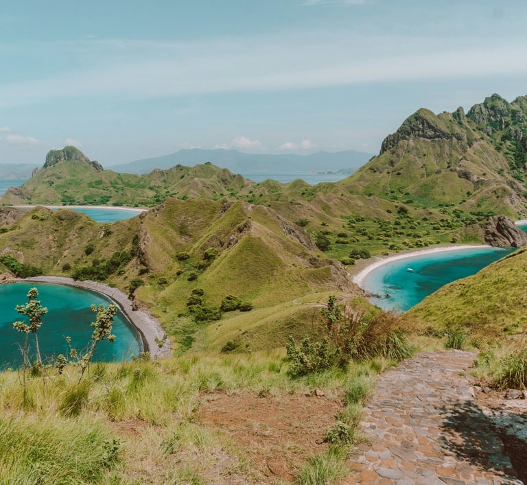 Top view of Padar Island, Komodo National Park, showing turquoise bays and rugged island hills