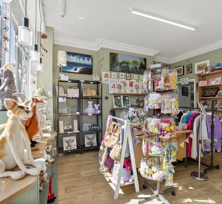 a store with a variety of stuffed animals and toys