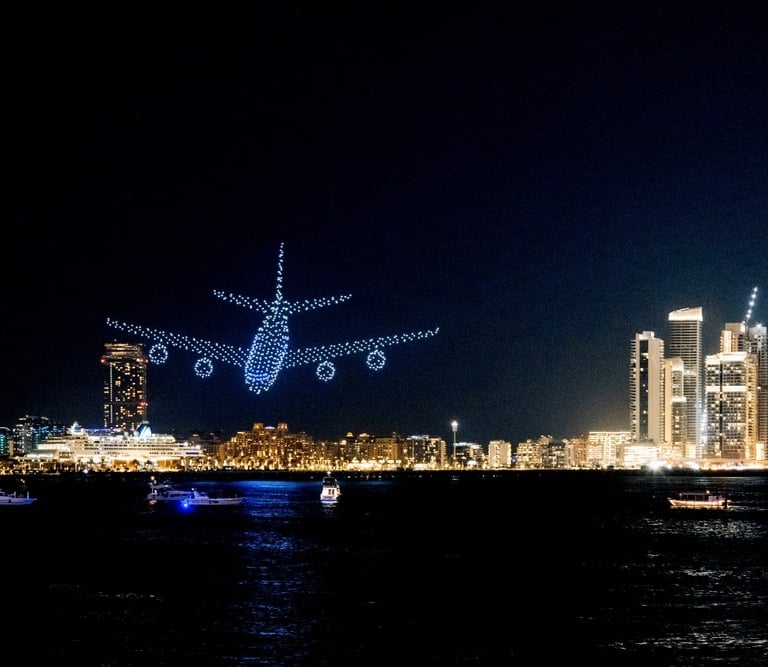 a plane flying over a city at night