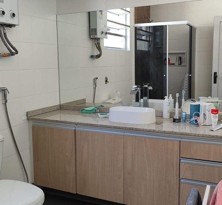 a bathroom with a toilet and a sink