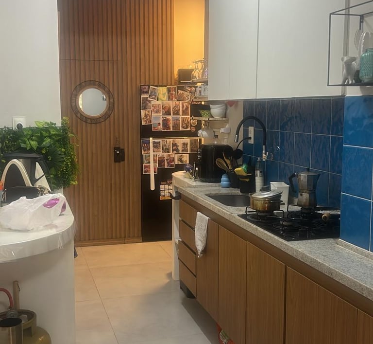 a kitchen with a sink and a stove