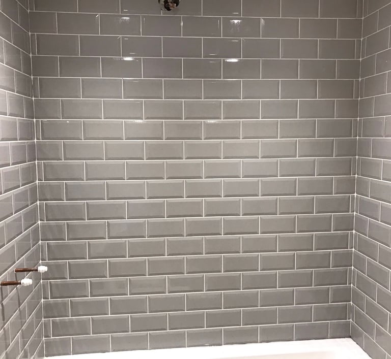 grey bathroom tiles, tiling work by lakes building and plastering services