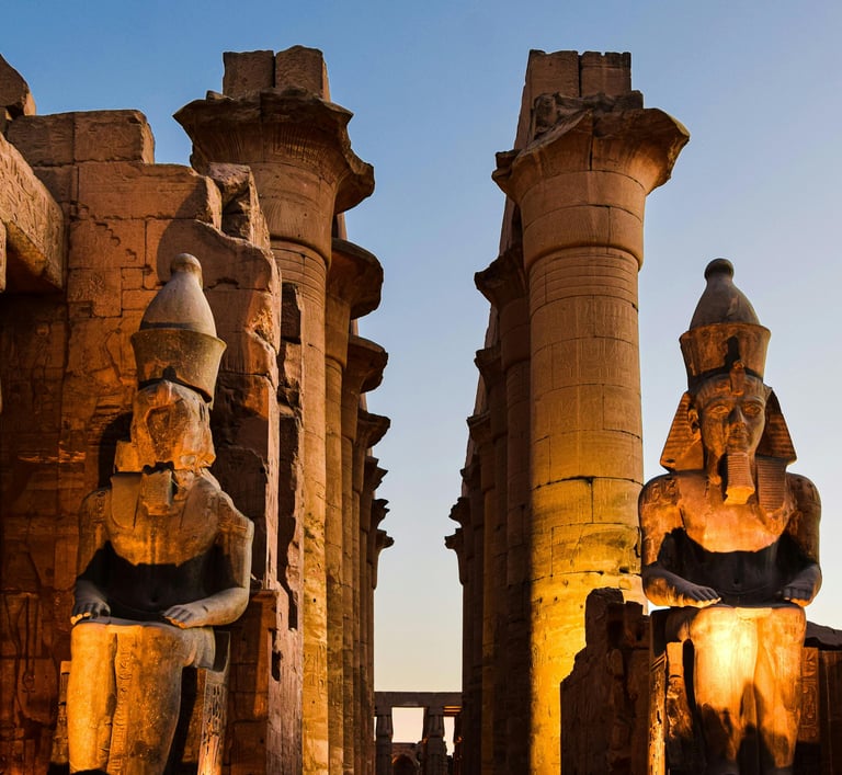 In the shadows of giants at Luxor Temple in Egypt