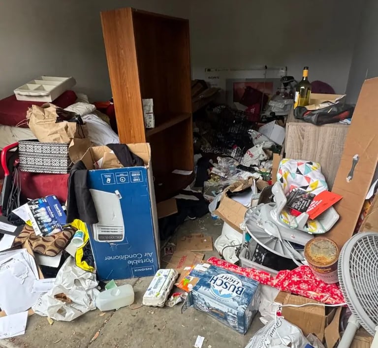 garage full of trash and furniture