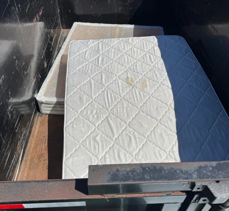 Mattress and box spring in a trailer