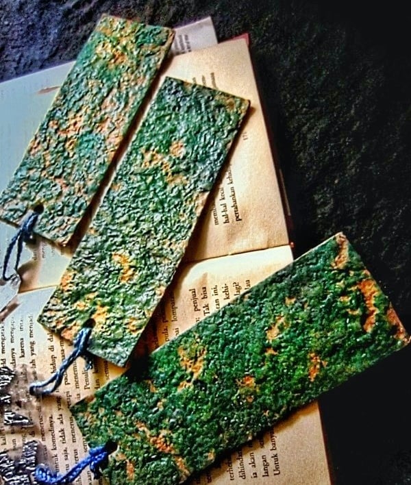 Recycle paper blue bookmark on the book