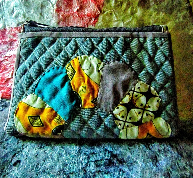 Recycled fabric pouch,beautiful pouch from a combination of quilting and fabric applique