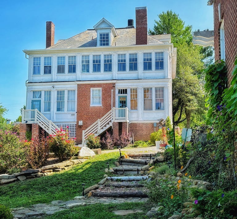 rear facade and garden of 2123 rivermont