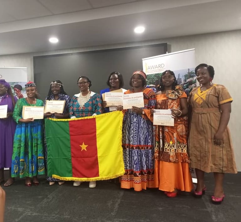 a group of people holding up certificates and holding certificates