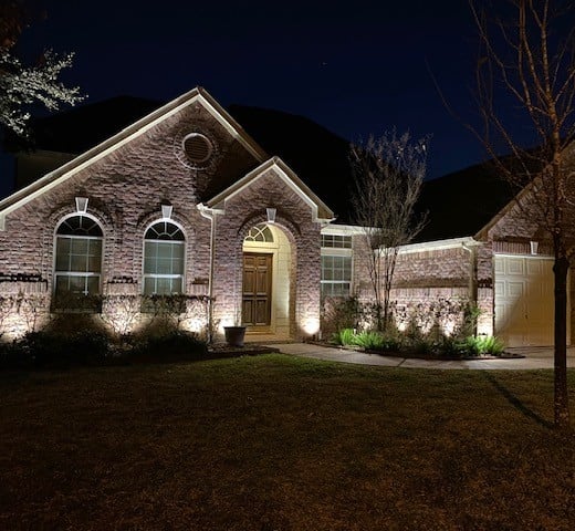 landscape lighting along front facade of house