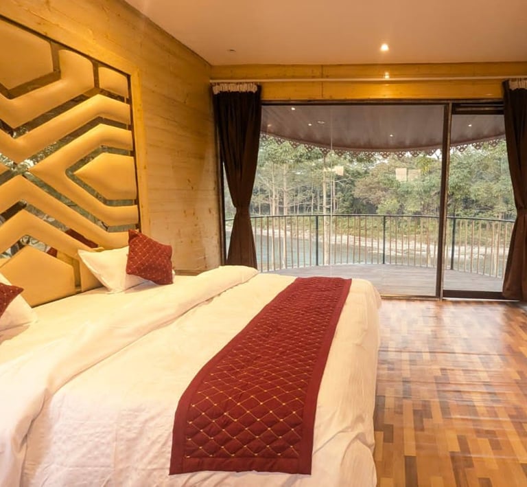 a bedroom with a bed and a television