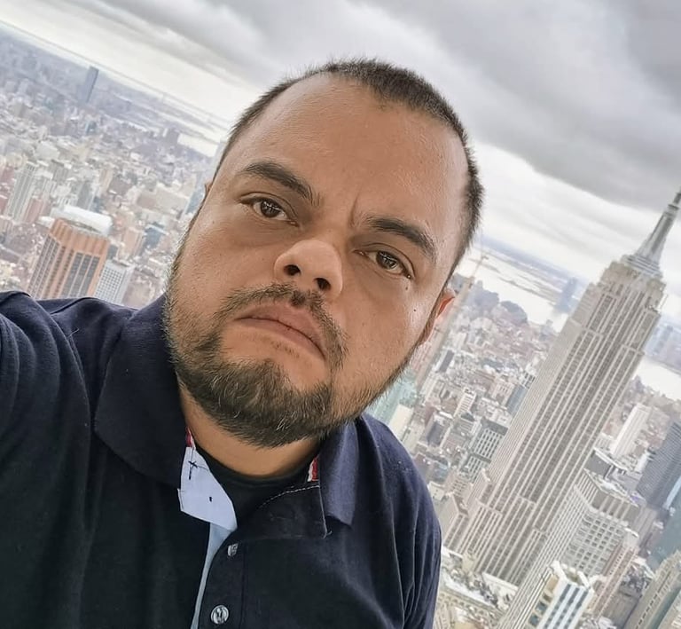 a man with a beard and a beard in a black shirt