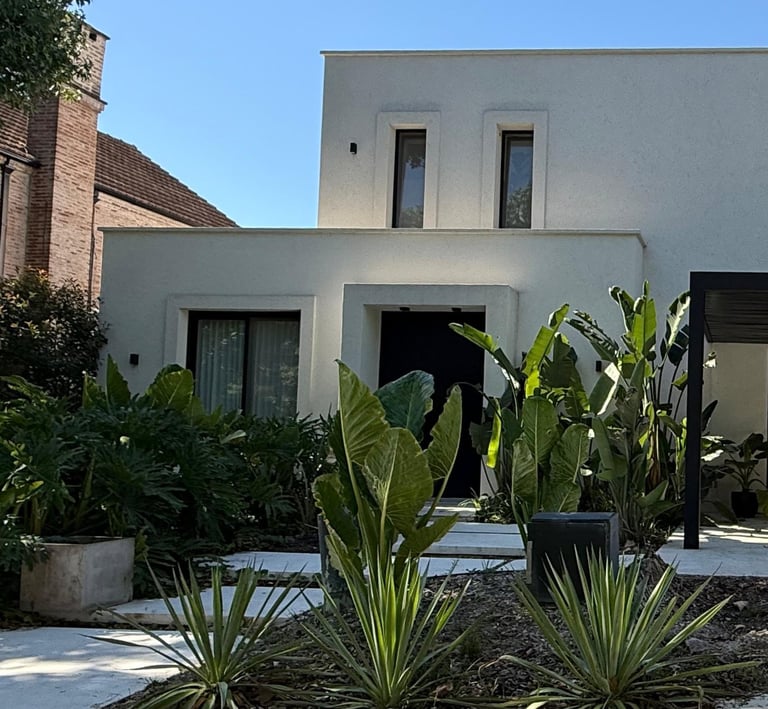 a house with a car parked in front of it