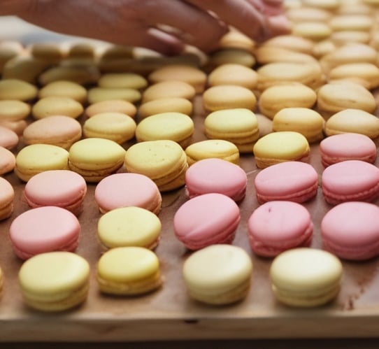 A vibrant market stall displaying colorful, locally made products.