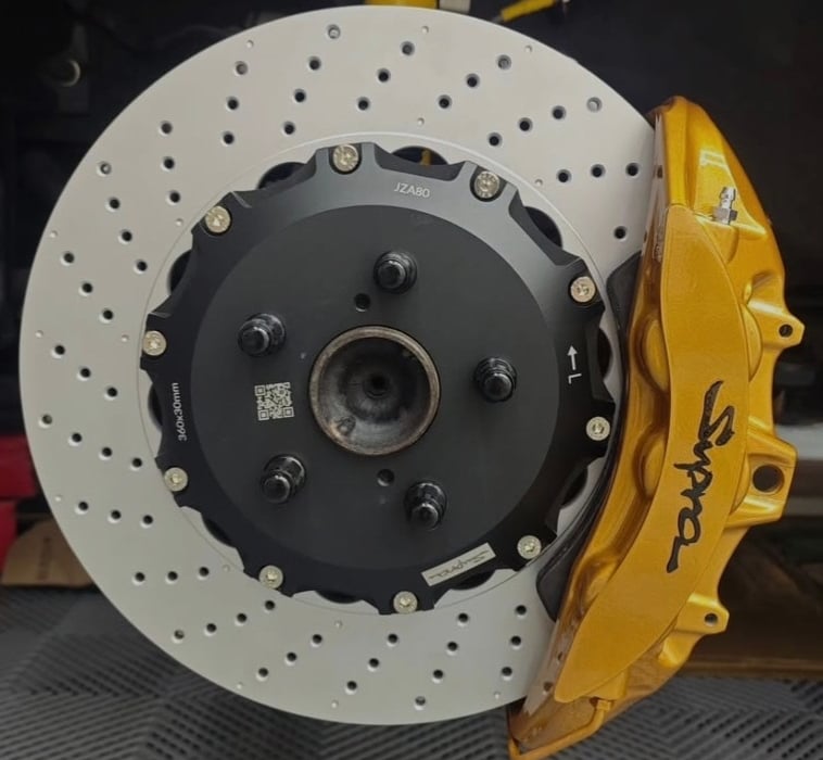 Front Brembo Gold CTSV calipers paired with 360x30mm drilled 2-piece rotors