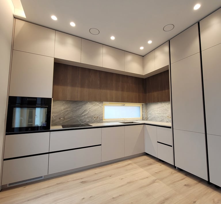 Bespoke Kitchen with  with a sleek Gola profile system, Front panels are fingerprint-resistant