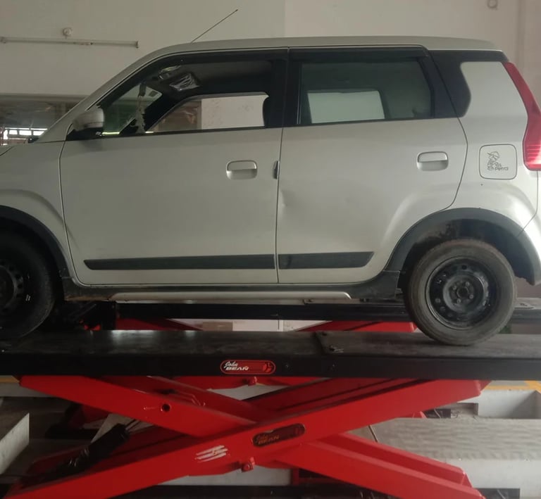 car tyre fitting service on hydraulic lift