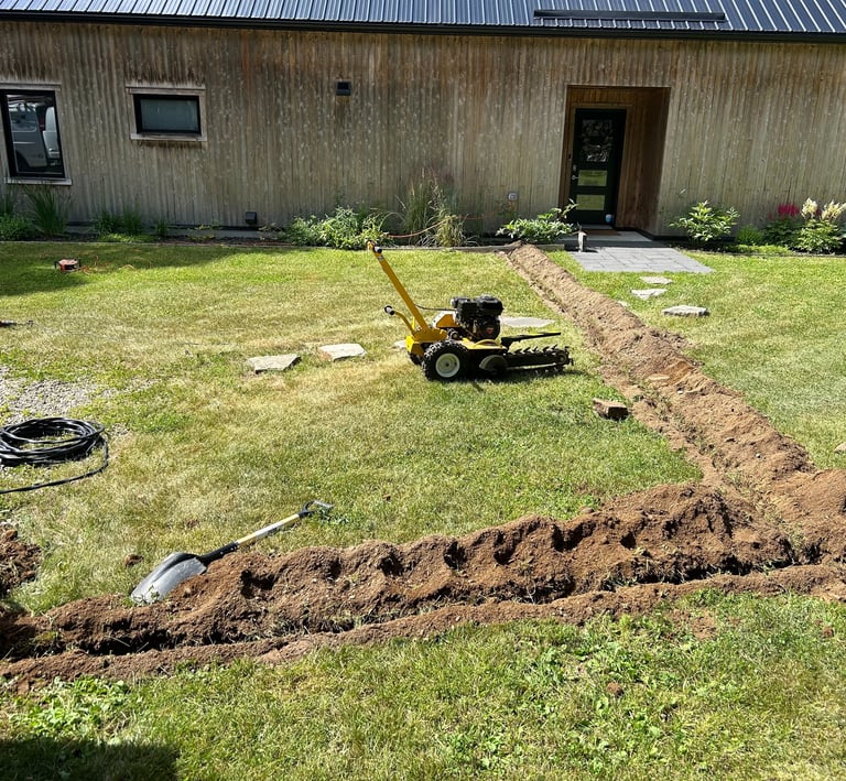 Entrepreneur électricien, à Québec et Lévis, qui fait la trenchée lui-même.