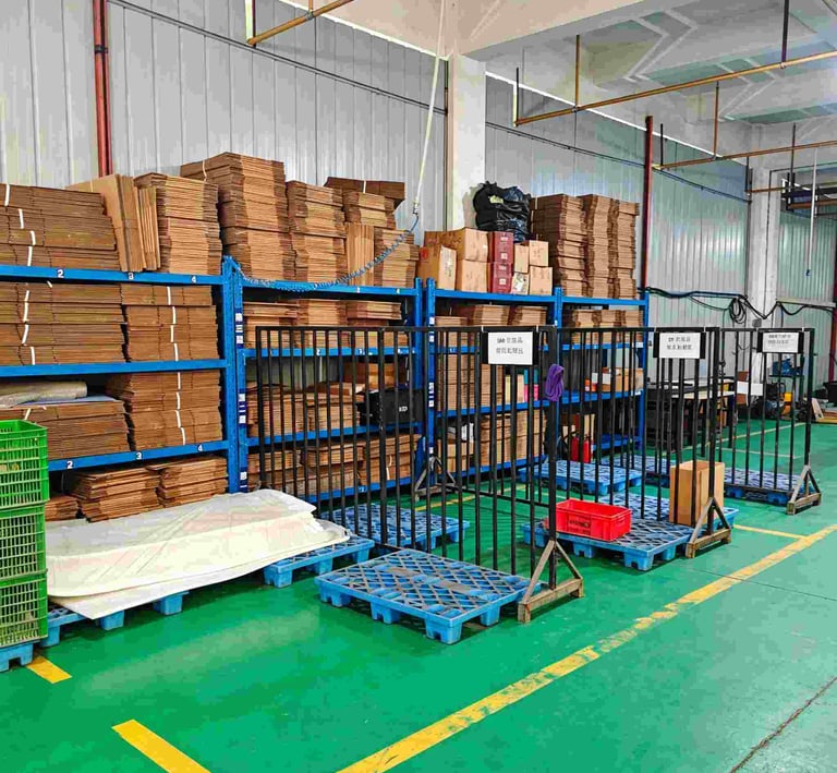 Organized warehouse storage with stacked cardboard boxes on blue shelving units and plastic pallets.
