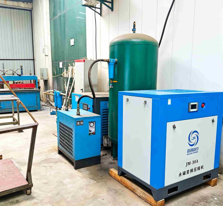 Industrial blue and white JM-30A permanent magnet variable frequency air compressor and green storage tank.