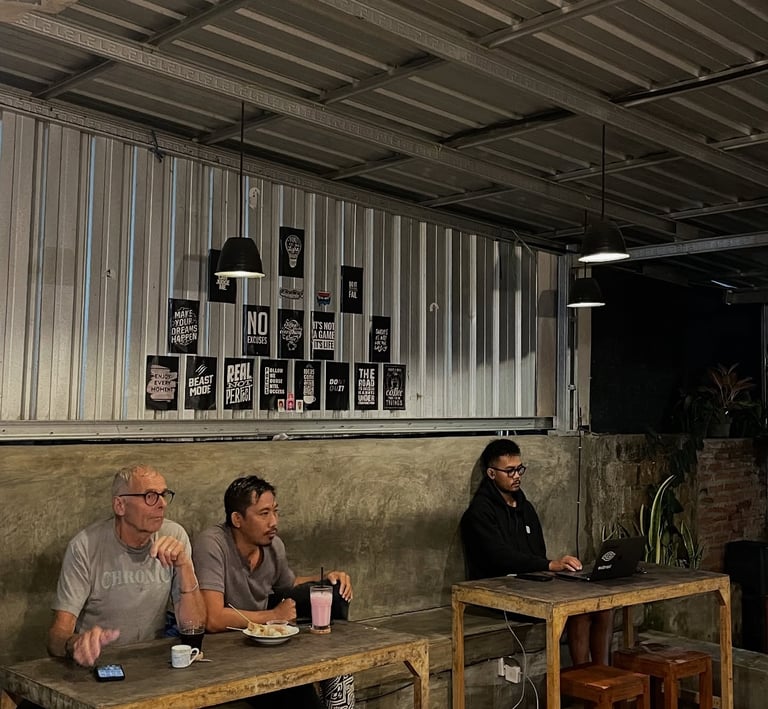 a group of people sitting at a table