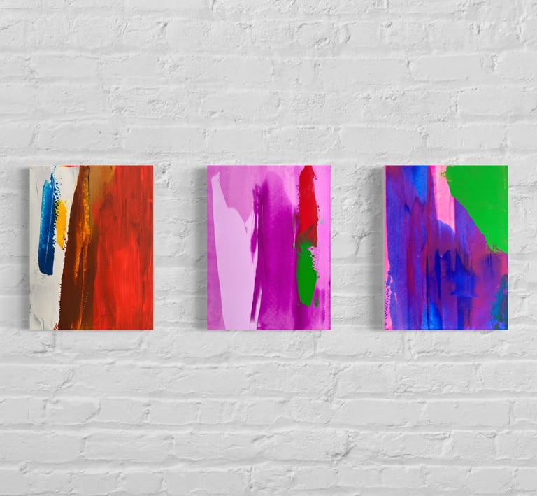 three paintings of abstract paintings of colorful paint on a brick wall