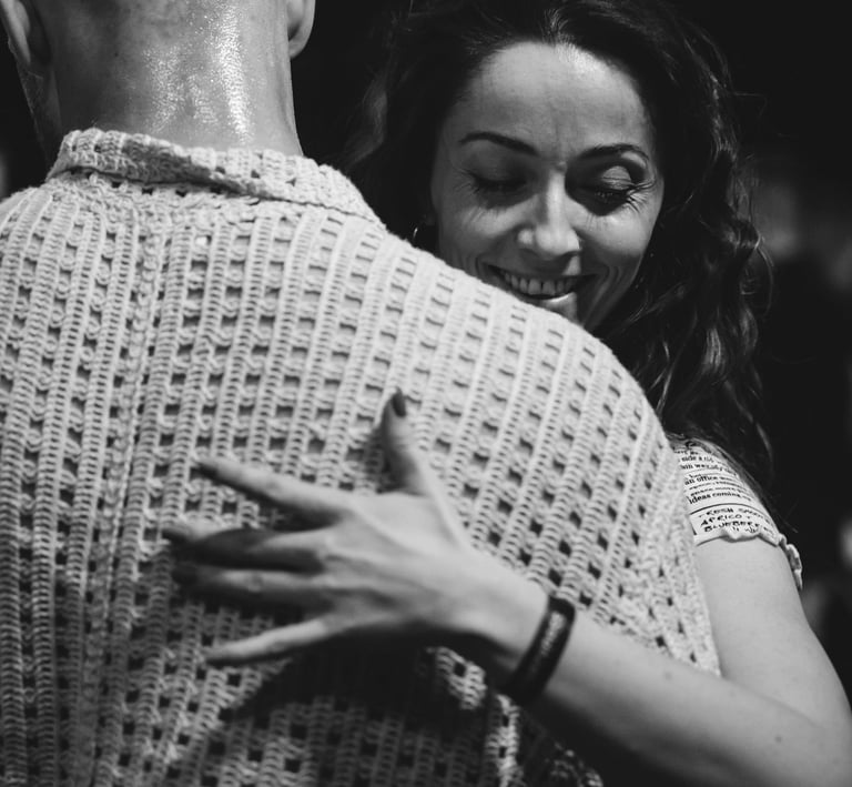 a man and woman dancing at a dance