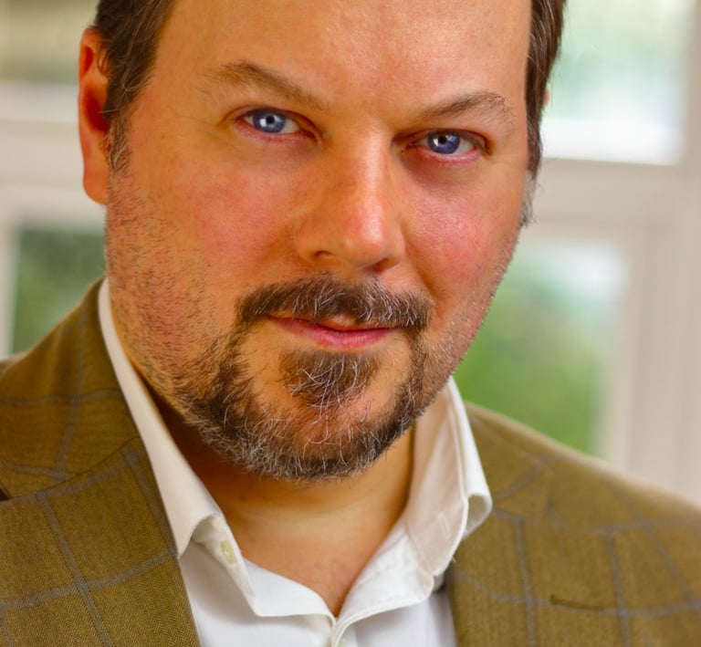 an image of the owner of the business. Intellingent. Professional. Amiable. Michael Meekin.
