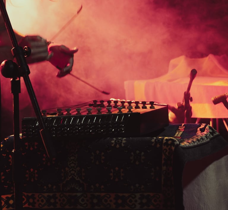 Libero Reina spinning a Persian Santoor in a dark room