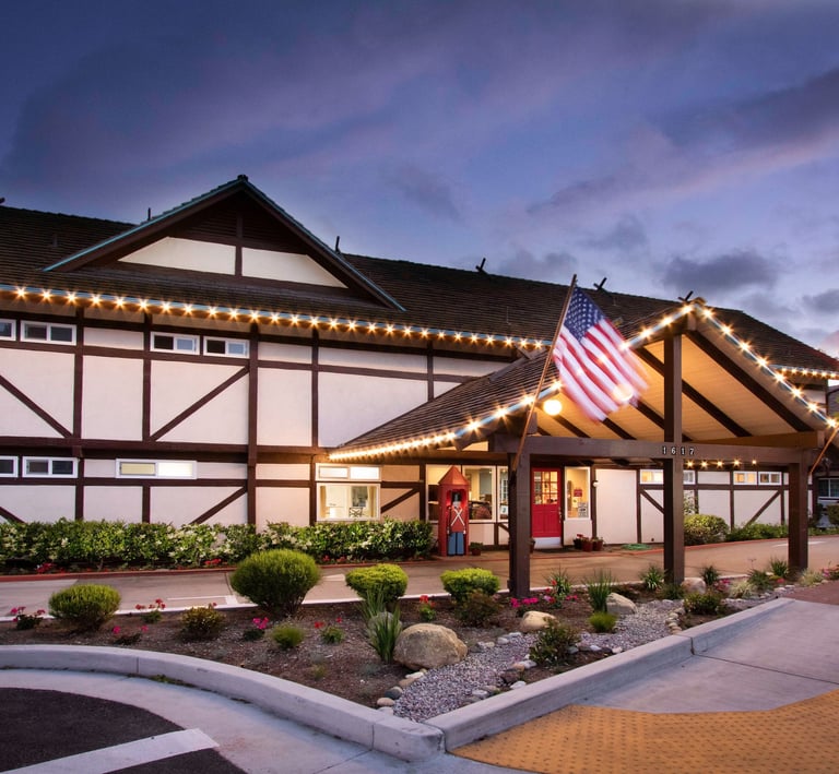King Frederik Inn in Solvang, California showing the entrance of a family-friendly hotel with Danish-style architecture