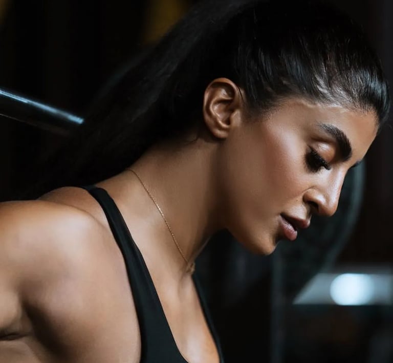 mais alhajri focused during workout wearing black sportswear