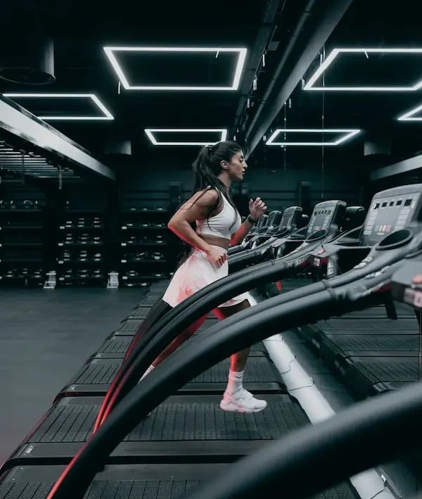 mais alhajri running on treadmill wearing white sportswear