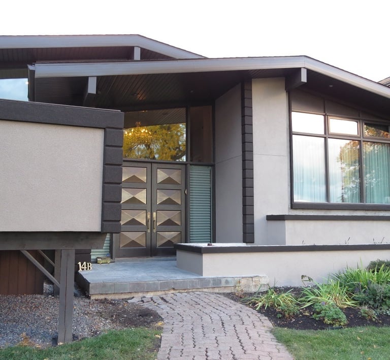 new stucco installation on modern residential home