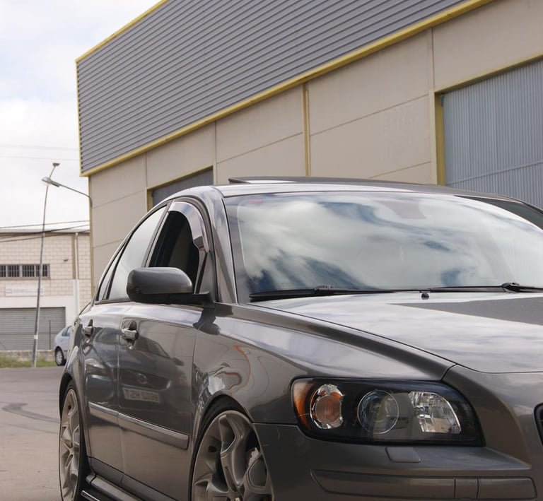 a car parked in front of a building