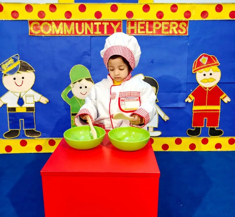 Child playing in essential services evnet of Enfant preschool in Happy heart ,brilliant mind 