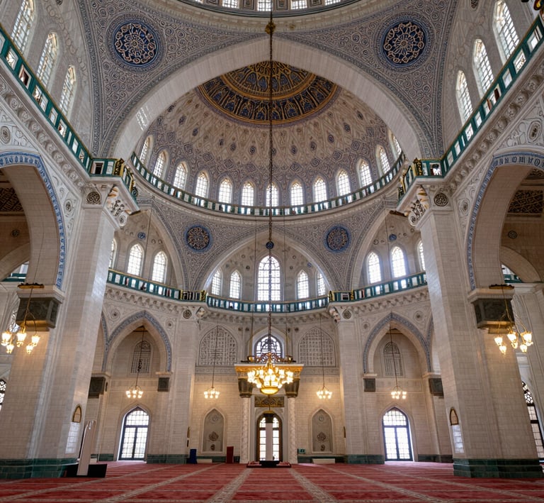 Students engaged in a lively online class, visible on laptop screens with focused expressions.