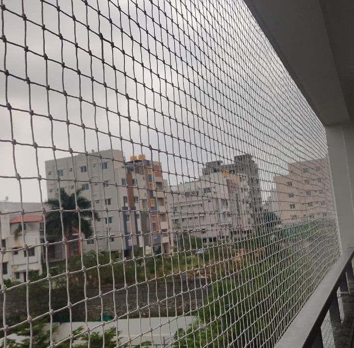 Close-up of a freshly installed balcony pigeon net in Bandhup West, showing the fine mesh and secure