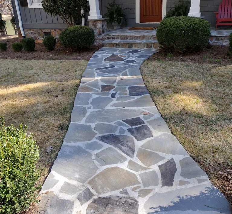 flagstone walkway winding thru the lawn