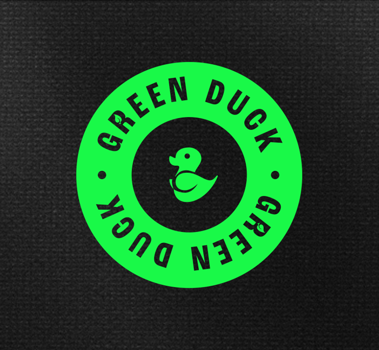 a green duck logo on a black background