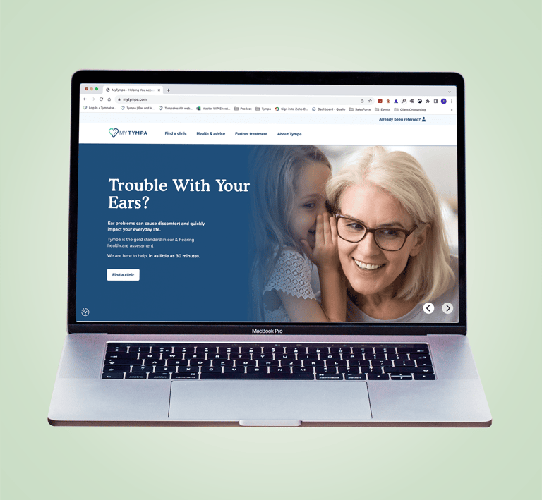 Modern laptop showing website and layout