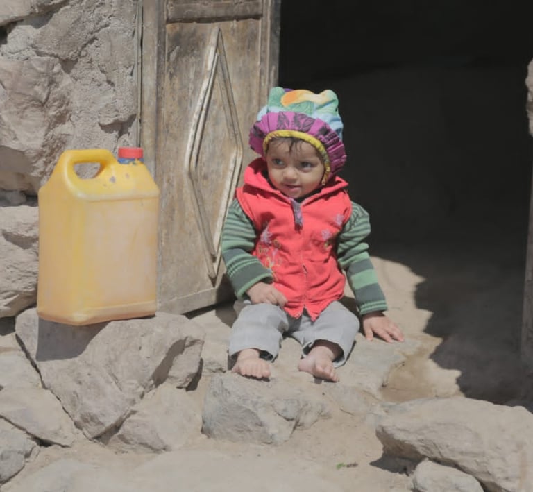 Muhamasheen child in house made of rocks