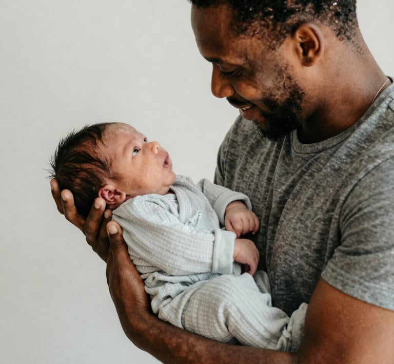 A doula training workshop with participants practicing supportive techniques in a bright studio.