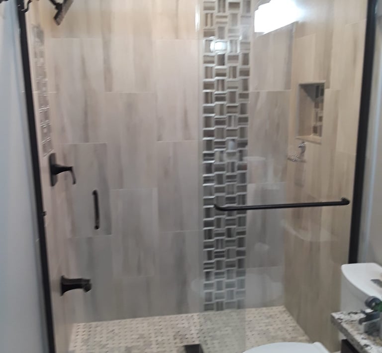 Affordable Showers specializes in bathroom remodeling, tub-to-shower conversions, vinyl showers
