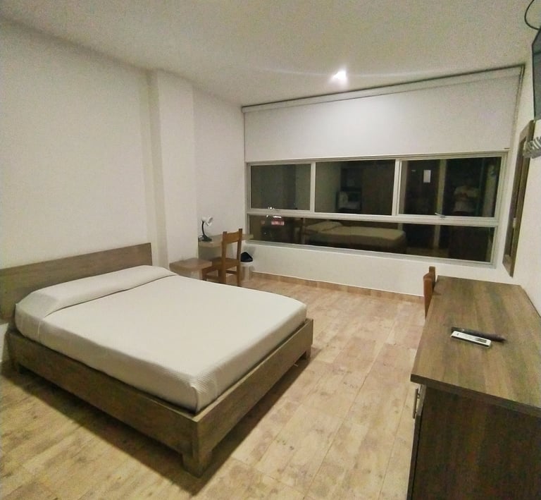 ¿Qué incluye una habitación minimalista en el Hotel Barbacoa? Nuestras habitaciones en Apartadó está