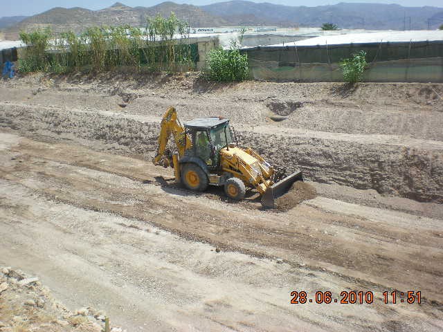 retroexcavadora mixta JCB martillo 