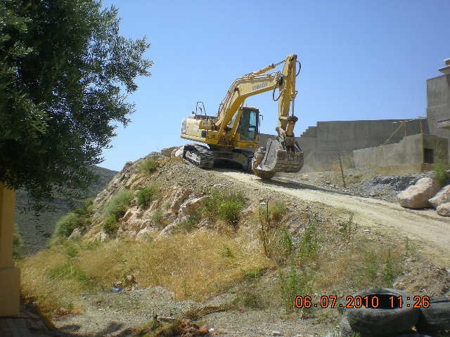 Retro de orugas para excavación de zanjas